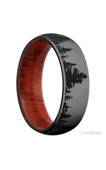 7 mm wide/Domed/Zirconium band with a laser carved Trees pattern also featuring a Padauk sleeve.