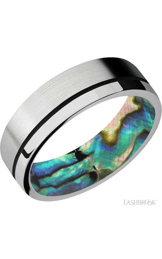 7 mm wide/Flat/14K White Gold band with one 0.5 mm Off Center inlay of Black also featuring a Abalone sleeve.