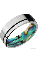 7 mm wide/Flat/14K White Gold band with one 0.5 mm Off Center inlay of Black also featuring a Abalone sleeve.