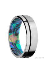 7 mm wide/Flat/14K White Gold band with one 0.5 mm Off Center inlay of Black also featuring a Abalone sleeve.