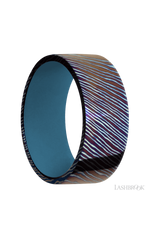 9 mm wide Flat Titanium Damascus band featuring a Royal Blue sleeve.