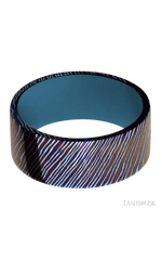 9 mm wide Flat Titanium Damascus band featuring a Royal Blue sleeve.