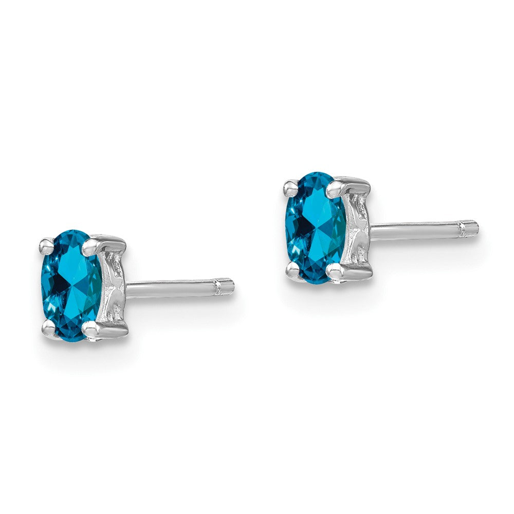 QBE29DEC Sterling Silver Rhodium-plated 5x3mm Oval Swiss Blue Topaz Post Earrings