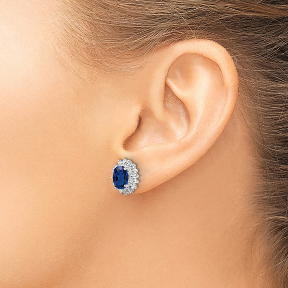 QCM1462 Cheryl M Sterling Silver Rhodium-plated Brilliant-cut Lab Created Dark Blue Spinel and Brilliant-cut White CZ Oval Halo Post Earrings