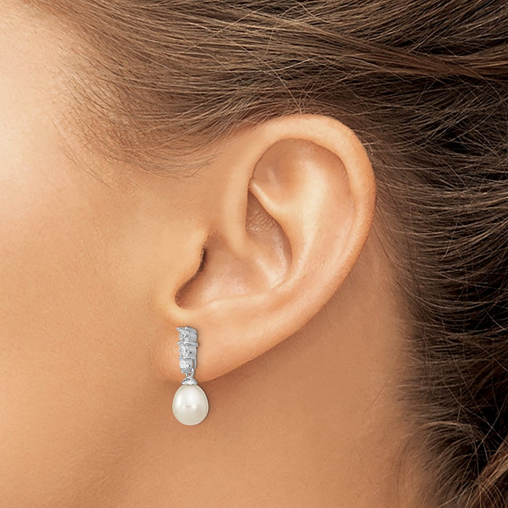 QE13859 Sterling Silver Rhodium-plated 7-8mm White Rice Freshwater Cultured Pearl and CZ Post Dangle Earrings