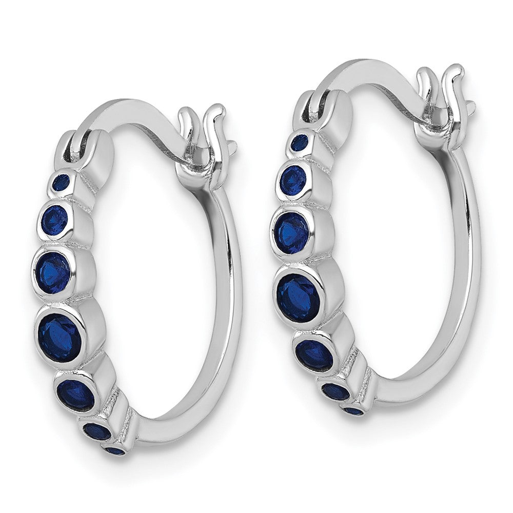 QE18335CSA Sterling Silver Rhodium-plated Graduated Blue Lab Created Sapphire Hoop Earrings