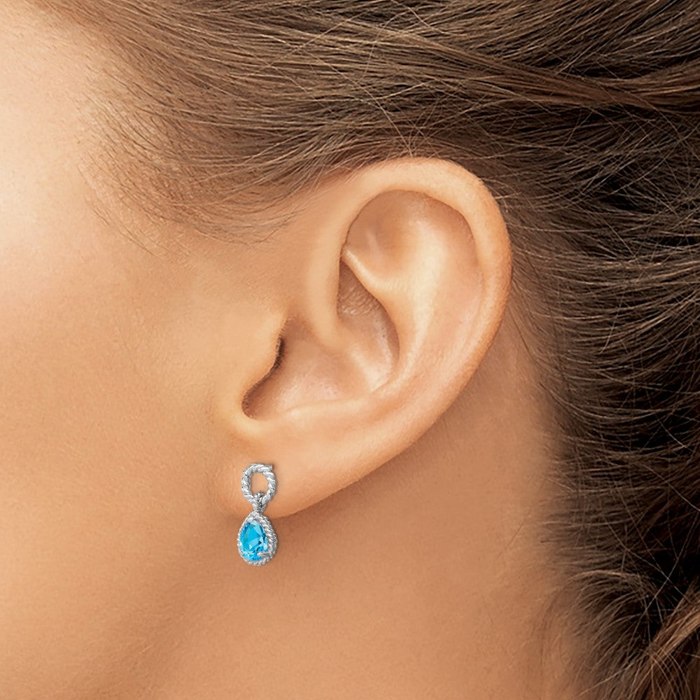 QE9796BT Sterling Silver Rhodium Plated Blue Topaz Pear Twisted Post Earrings