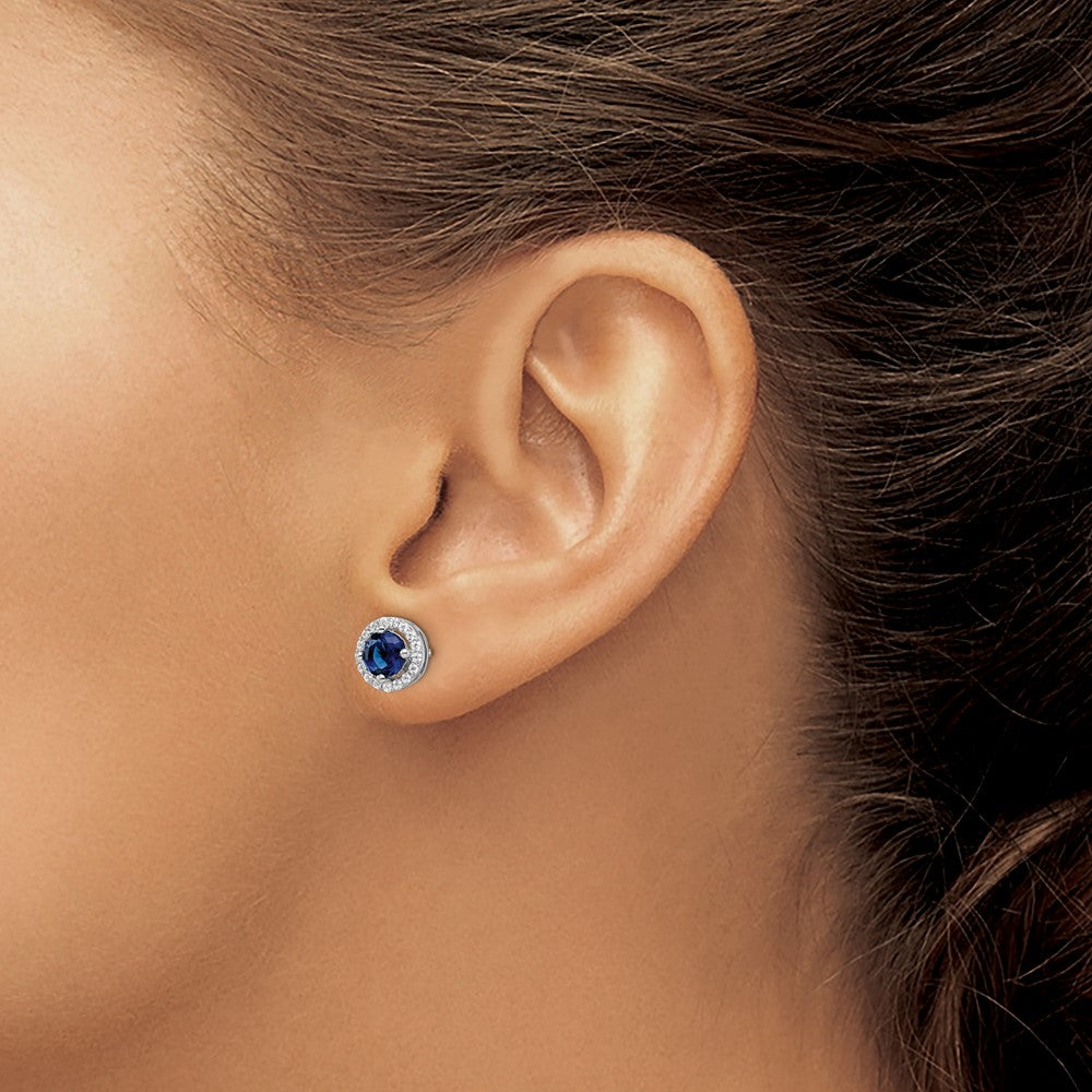 QMP1335 Brilliant Embers Sterling Silver Rhodium-plated 34 Stone White and Blue Micro Pav������������������������������������������������������ Halo CZ Post Earrings
