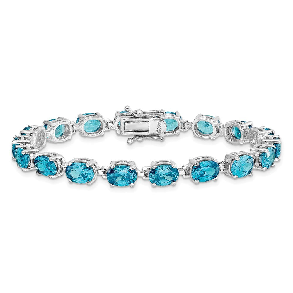 Sterling Silver Rhodium-plated Blue Topaz 6.5in Bracelet QX5BT
