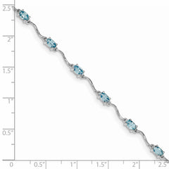 Sterling Silver Rhodium-plated Blue Topaz Bracelet QX841BT