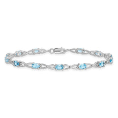 Sterling Silver Rhodium-plated Blue Topaz Bracelet QX842BT