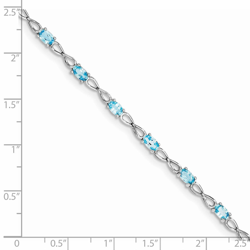 Sterling Silver Rhodium-plated Blue Topaz Bracelet QX842BT