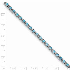 Sterling Silver Rhodium-plated Blue Topaz and Diamond Bracelet QX853BT