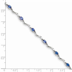 Sterling Silver Rhodium Plated Diamond and Tanzanite Bracelet QX870TZ