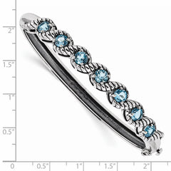 Sterling Silver Rhodium-plated Light Swiss Blue Topaz Hinged Bangle QX985BT