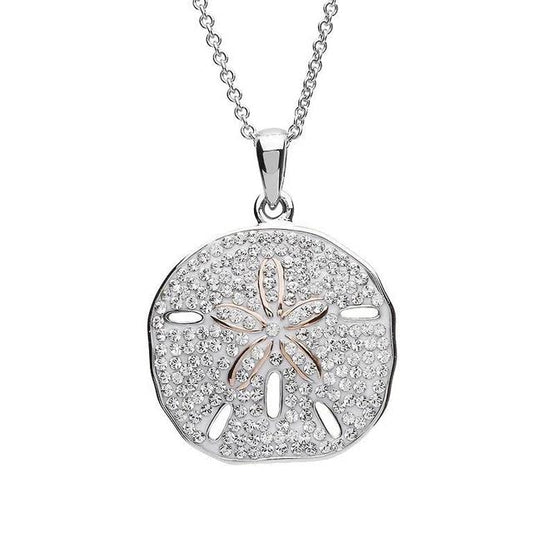 Sterling silver sand dollar necklace with rose gold plated center and white crystals