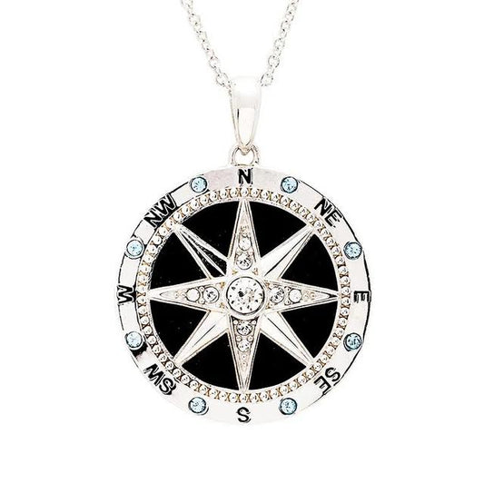 Sterling silver compass necklace with black enamel and white crystal center