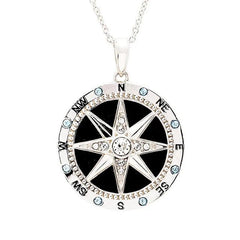 Sterling silver compass necklace with black enamel and white crystal center