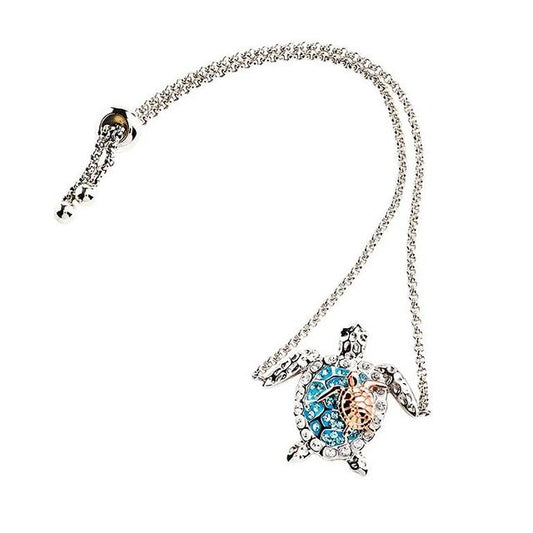 Sterling silver turtle bracelet with light blue crystals and rose gold plated baby turtle