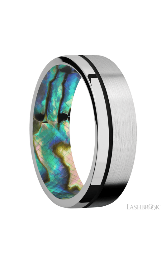 7 mm wide/Flat/14K White Gold band with one 0.5 mm Off Center inlay of Black also featuring a Abalone sleeve.