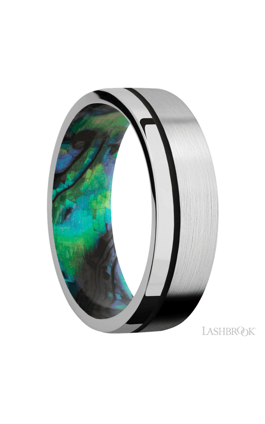7 mm wide/Flat/14K White Gold band with one 0.5 mm Off Center inlay of Black also featuring a Abalone sleeve.
