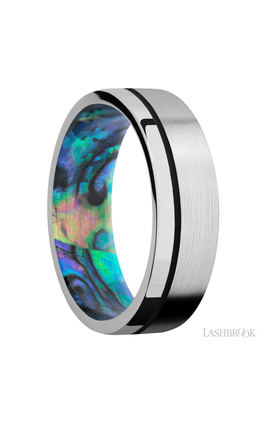 7 mm wide/Flat/14K White Gold band with one 0.5 mm Off Center inlay of Black also featuring a Abalone sleeve.