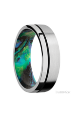 7 mm wide/Flat/14K White Gold band with one 0.5 mm Off Center inlay of Black also featuring a Abalone sleeve.