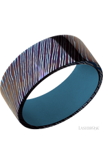 9 mm wide Flat Titanium Damascus band featuring a Royal Blue sleeve.
