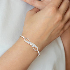 Sterling Silver Infinity w/Feather Bangle Bracelet QB1139