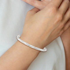 Sterling Silver Polished Twisted Hinged Bangle QB1429