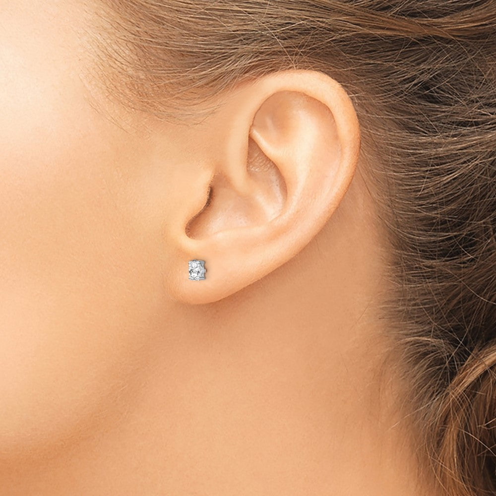 QBE29APR Sterling Silver Rhodium-plated 5x3mm Oval White Topaz Post Earrings