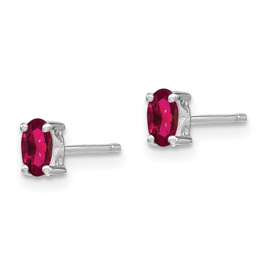QBE29JUL Sterling Silver Rhodium-plated 5x3mm Oval Created Ruby Post Earrings