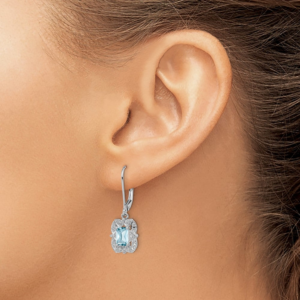 QE10165BT Sterling Silver Rhodium-plated Diamond and Blue Topaz Earrings