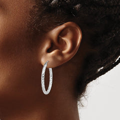QE11582 Sterling Silver RH-plated D/C Textured 3mm Oval Hoop Earrings