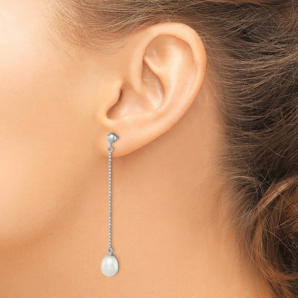 QE12776 Sterling Silver Rhodium-plated 7-8mm White Rice Freshwater Cultured Pearl Post Dangle Earrings