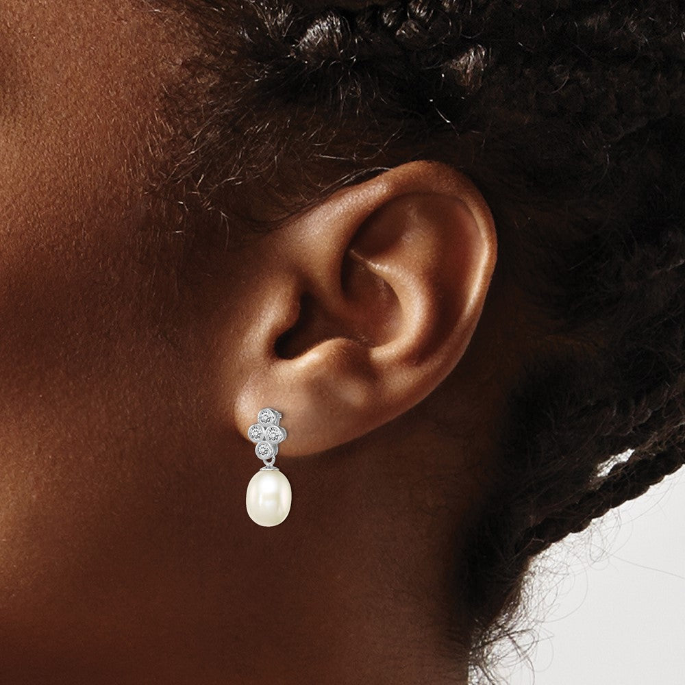QE12778 Sterling Silver Rhodium-plated 7-8mm White Rice Freshwater Cultured Pearl and CZ Post Dangle Earrings