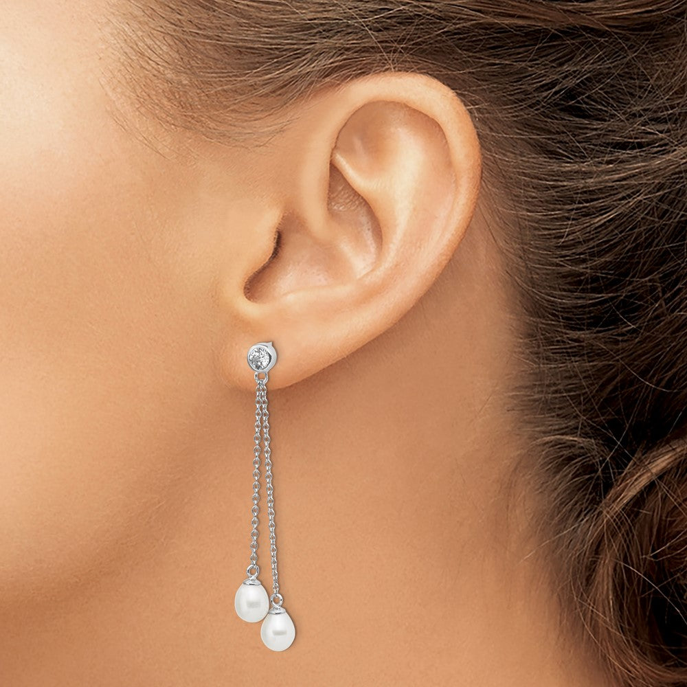 QE13853 Sterling Silver Rhodium-plated 6-7mm White Rice Freshwater Cultured Pearl and CZ Post Dangle Earrings