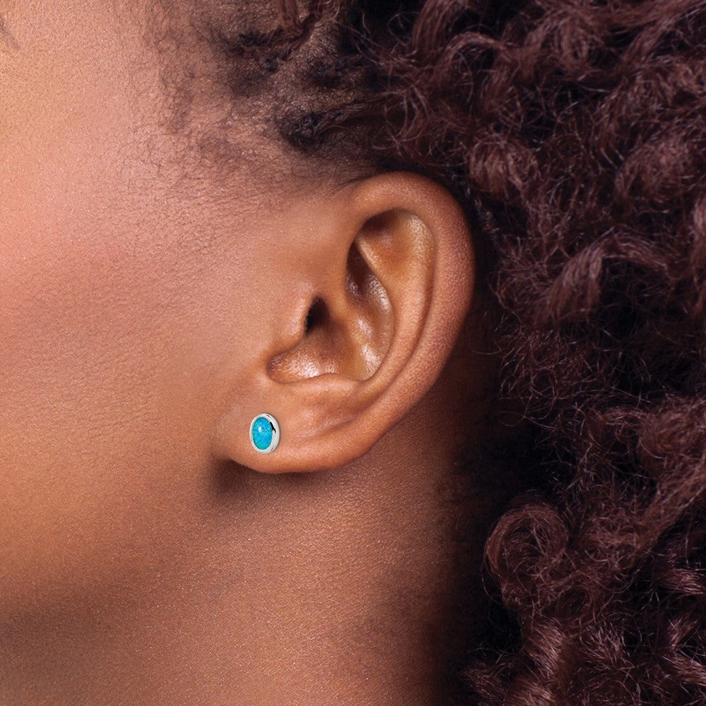 QE15192 Sterling Silver RH-plated Polished Blue Created Opal Oval Stud Earrings