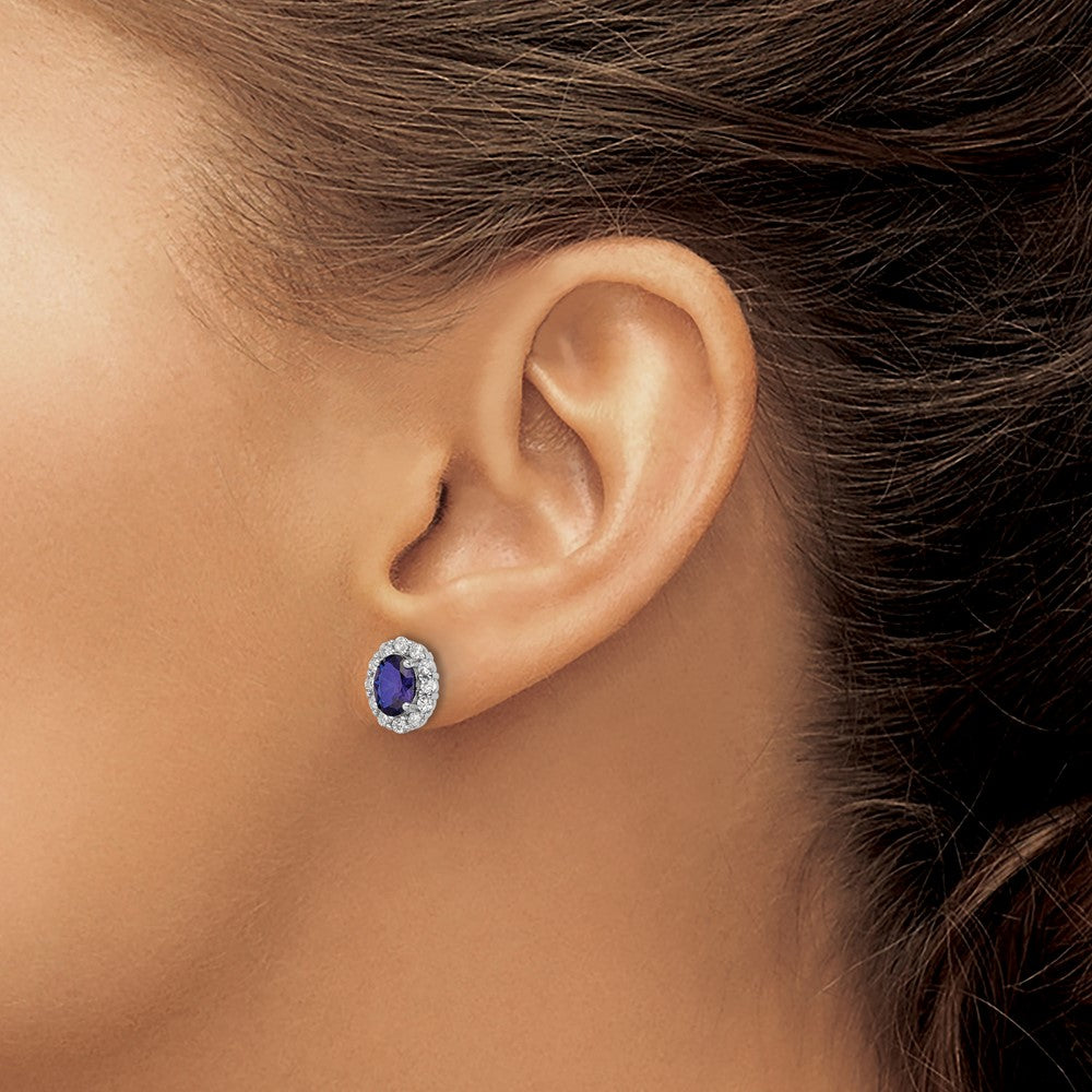 QE16168 Sterling Silver Rhodium-plated Polished Blue & White CZ Oval Post Earrings