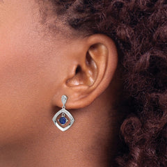 QE16762 Sterling Silver RH-pltd Blue Glass and Clear CZ Fancy Square Post Earrings