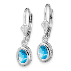 QE2043BT Sterling Silver Rhodium Plated 7x5mm Oval Blue Topaz Leverback Earrings