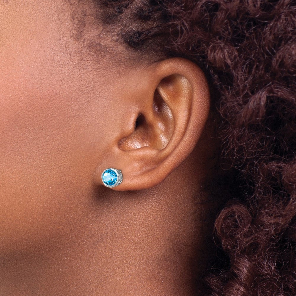 QE9411BT Sterling Silver Rhodium-plated Blue Topaz Circle Stud Earrings