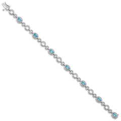 Sterling Silver Rhodium-plated Dia. & Lt Swiss Blue Topaz Oval Bracelet QX819BT