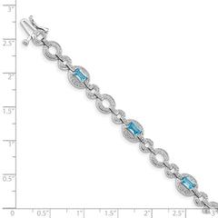 Sterling Silver Rhodium-plated Dia. & Lt Swiss Blue Topaz Oval Bracelet QX819BT