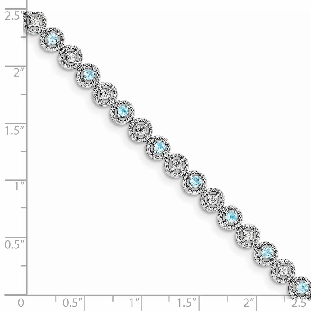 Sterling Silver Rhodium-plated Blue Topaz Diamond Bracelet QX829BT