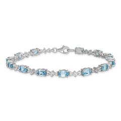 Sterling Silver Rhodium-plated Blue & White Topaz Bracelet QX854BT