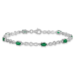 Sterling Silver Rhodium-plated Emerald and Diamond Bracelet QX860E