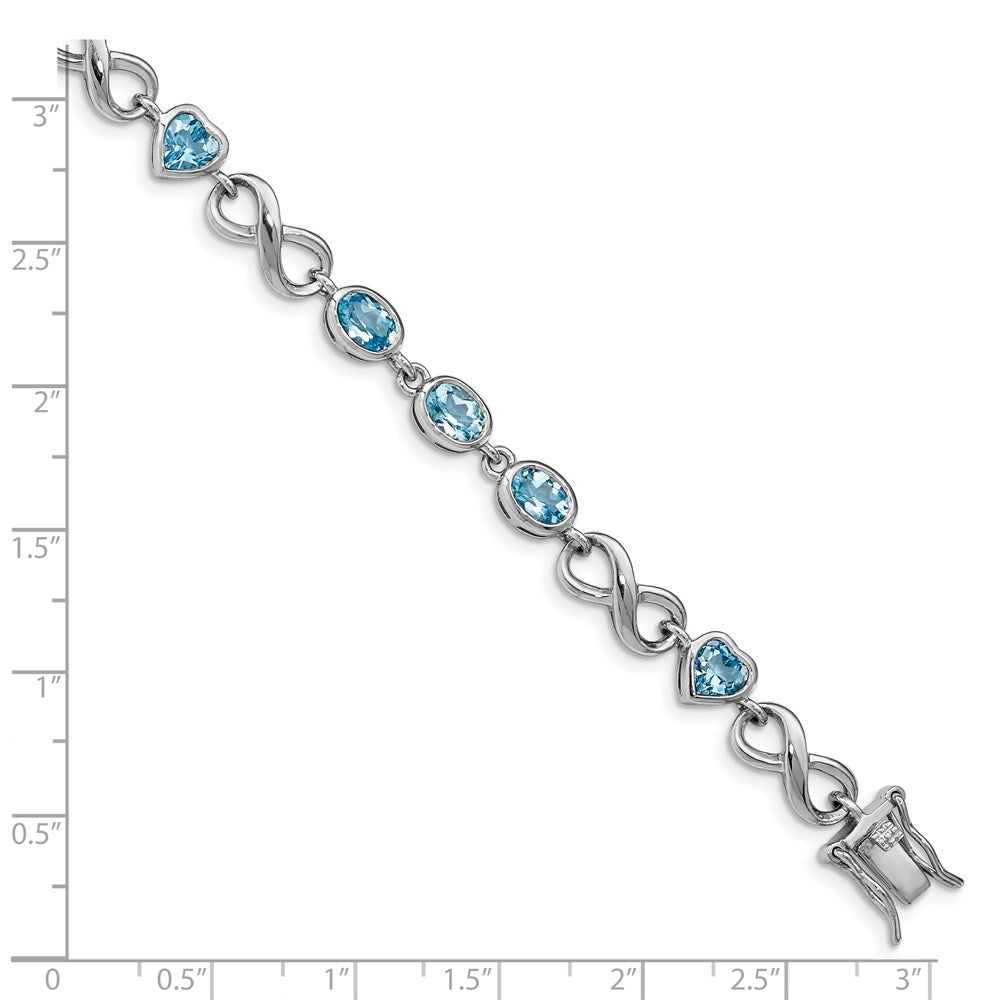 Sterling Silver Rhodium-plated Oval Heart Blue Topaz Bracelet QX875BT